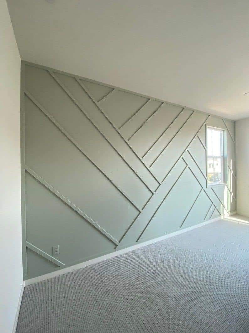Deep green accent wall with custom trim work